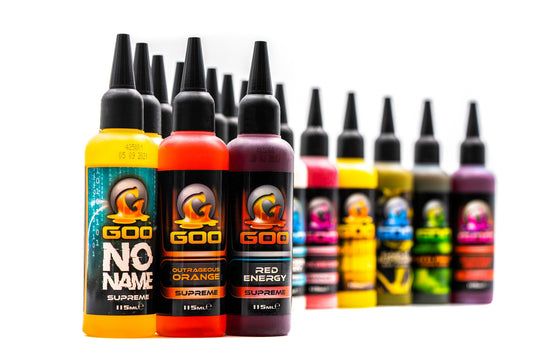 Multiple bottles of Korda Goo in various colors, designed for use in fishing, labeled with the brand and product name. All Bottles