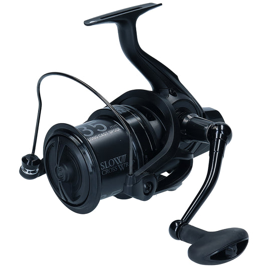 Black fishing reel on a white background