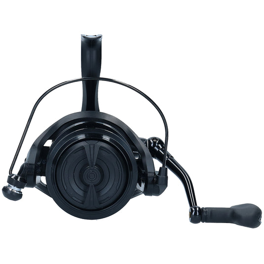 Black fishing reel on a white background