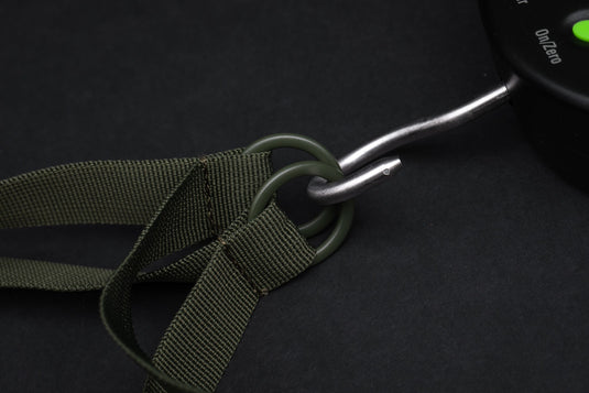 Korda Compac Weigh Sling Kamo, lightweight camouflage fish weighing sling designed for safe and accurate catch weighing. Hook Point
