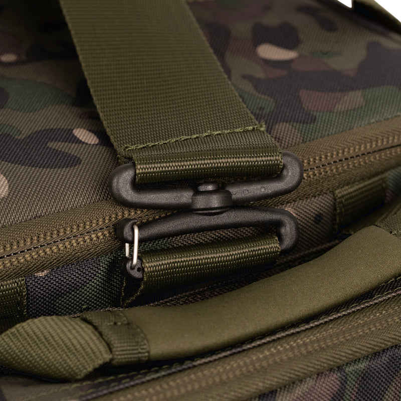 Load image into Gallery viewer, A Trakker NXC Camo Pro Carryall Medium fishing bag with camouflage pattern in a green colour. Zoom in on strap
