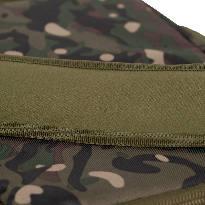 Load image into Gallery viewer, A Trakker NXC Camo Pro Carryall Medium fishing bag with camouflage pattern in a green colour. Zoom in on strap stich

