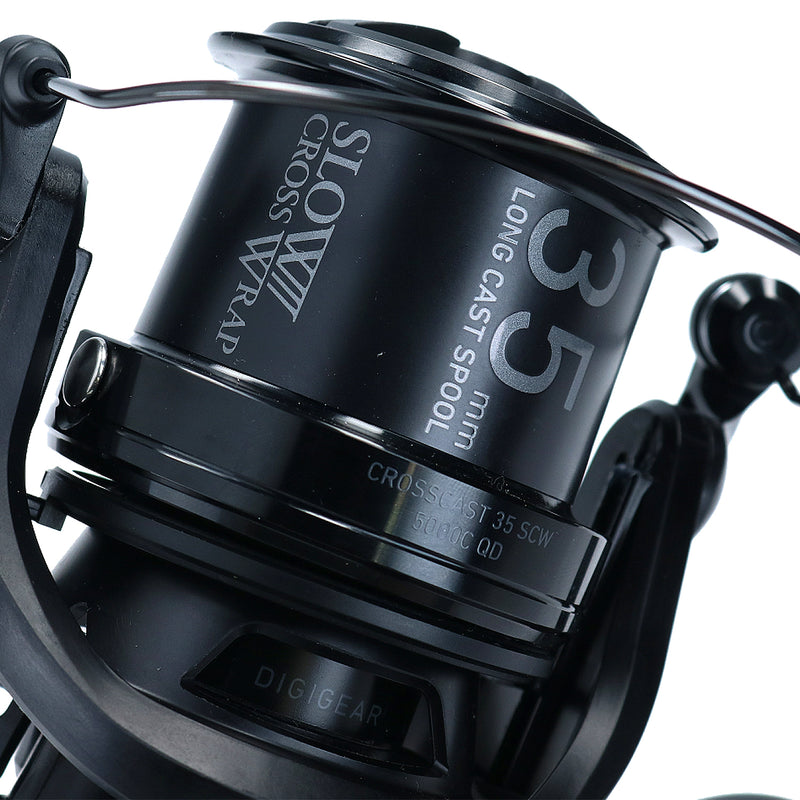 Load image into Gallery viewer, Close-up of a black fishing reel with branding on a white background
